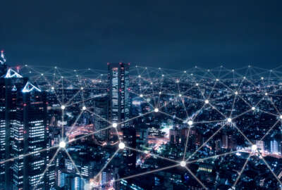Telecommunication network above city, wireless mobile internet technology for smart grid or 5G LTE data connection, concept about IoT, global business, fintech, blockchain