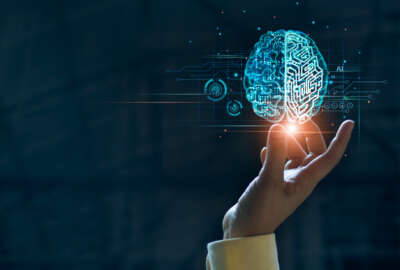 Hand touching brain of AI, Symbolic, Machine learning, artificial intelligence of futuristic technology. AI network of brain on business analysis, innovative and business growth development.