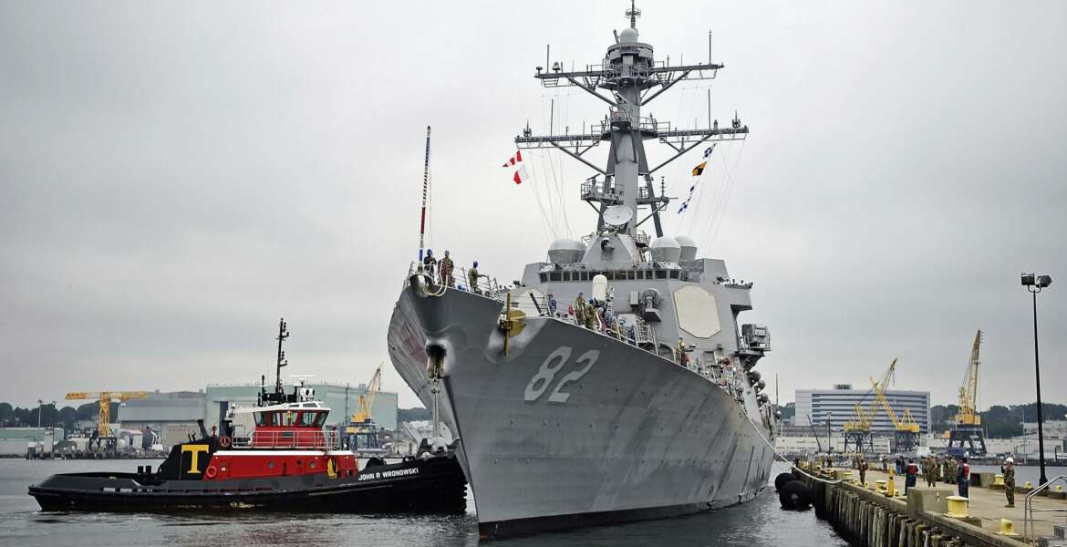 FILE - In this Sept. 6, 2019 file photo, the U.S. Navy Arleigh Burke-class guided missile destroyer USS Lassen (DDG-82) moors at Fort Trumbull State Park in New London, Conn.  The Navy is proposing construction cutbacks and accelerated ship retirements that would delay, or sink, the Navy’s goal of a larger fleet — and potentially hurt shipyards, according to an initial proposal.    The proposal would shrink the size of the fleet from today’s level of 293 ships to 287 ships, a far cry from the official goal of 355 ships established in the 2018 National Defense Authorization Act.  (Sean D. Elliot/The Day via AP, File)