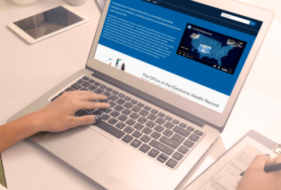 A person accesses the Department of Veterans Affairs' EHR system on a laptop.